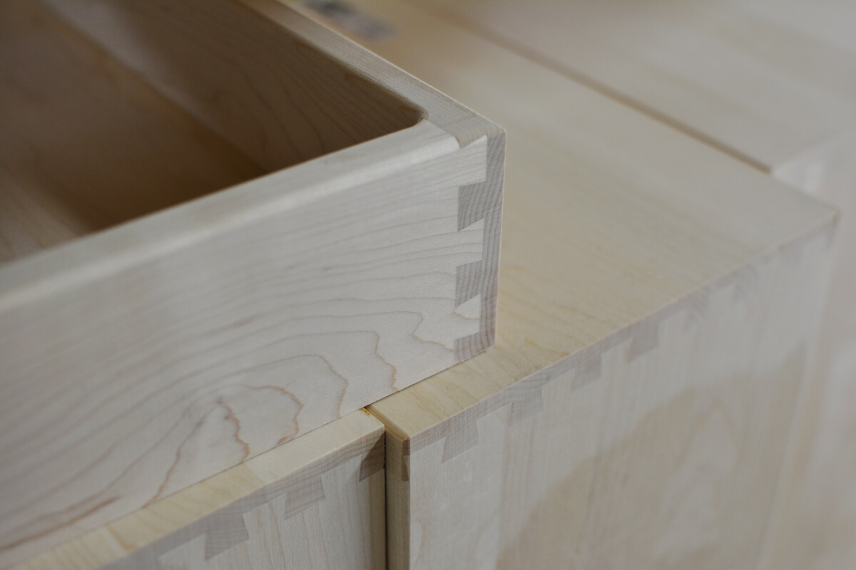 Close-up of dovetail joints in a drawer box